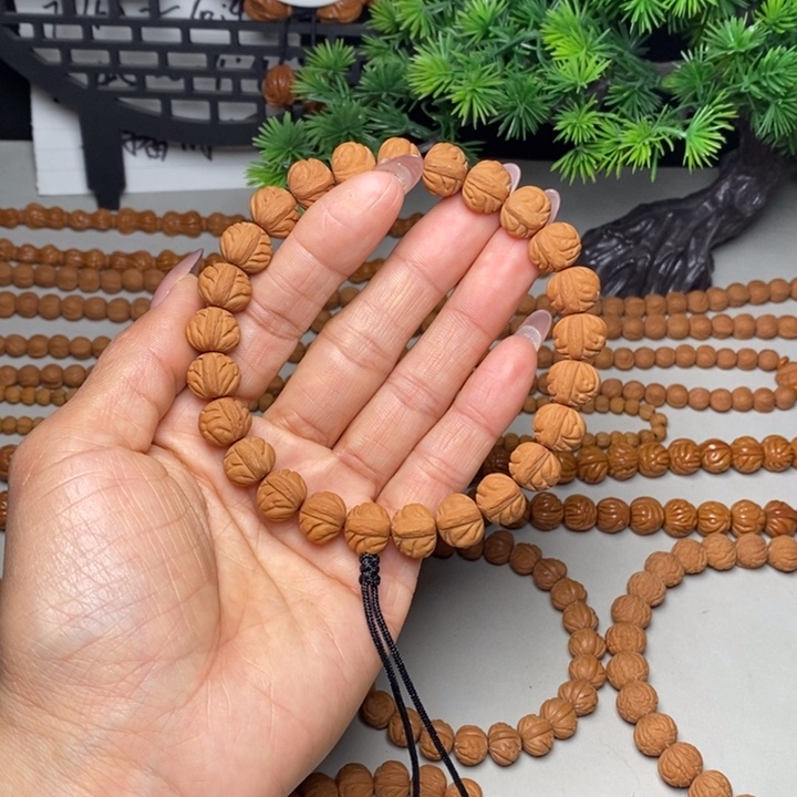 桃核手串凤羽手持