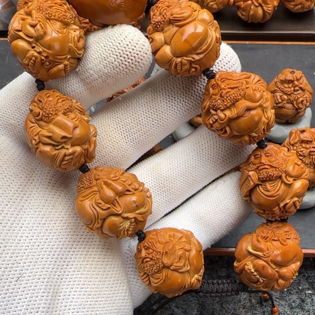 橄榄核吊坠达摩呀呀