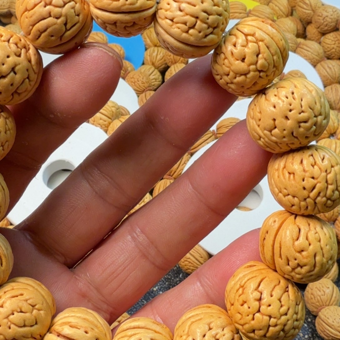 宁***由吊坠桃核盘锦肌肉