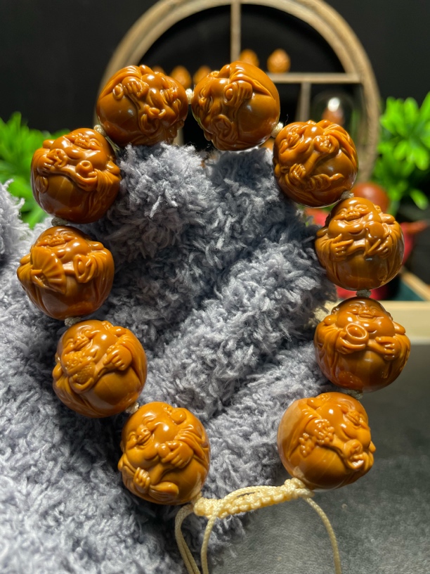 橄榄核手工雕刻2.0正圆树王铁核包衣弥勒