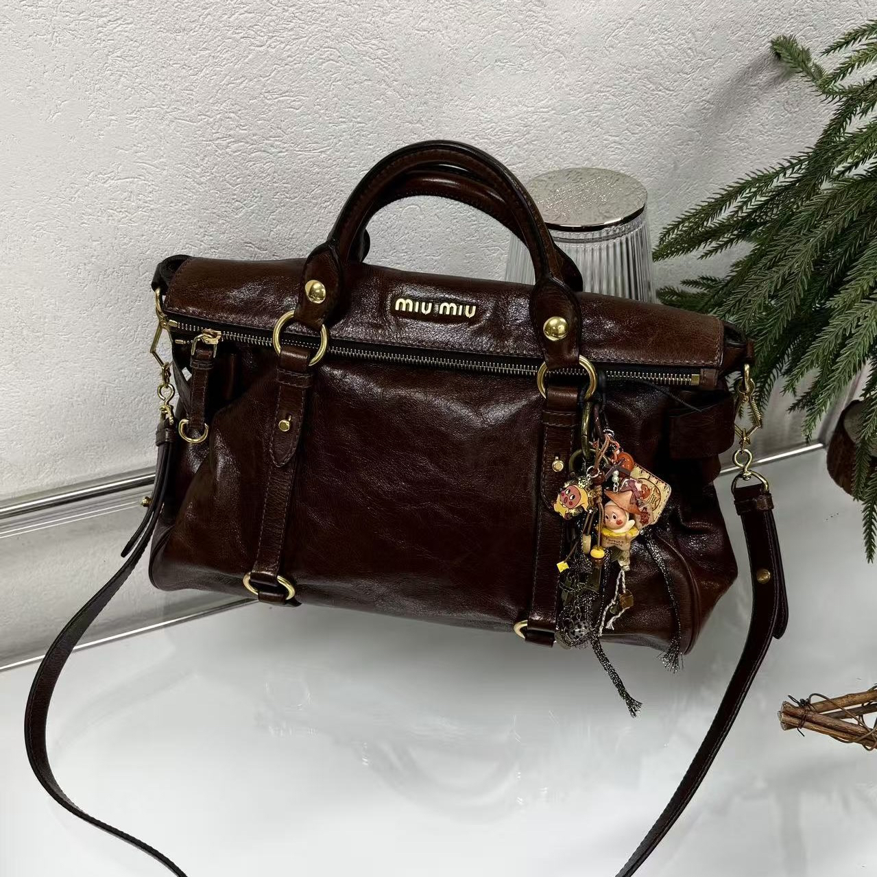 95新 MIU MIU/缪缪 巨新深巧棕色油蜡皮机车蝴蝶结单肩斜挎包