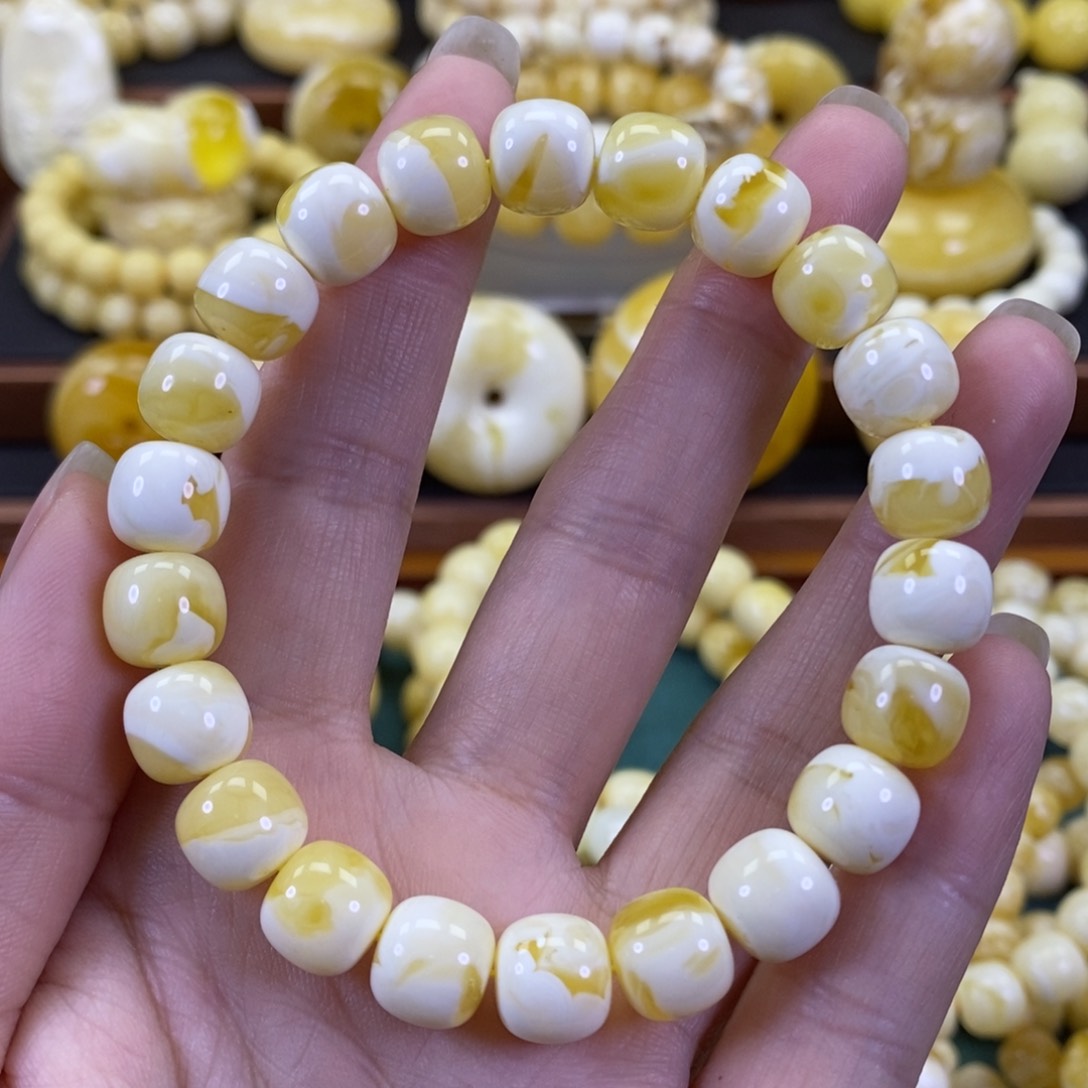 琥珀裸石未镶嵌同料金瓷白手串