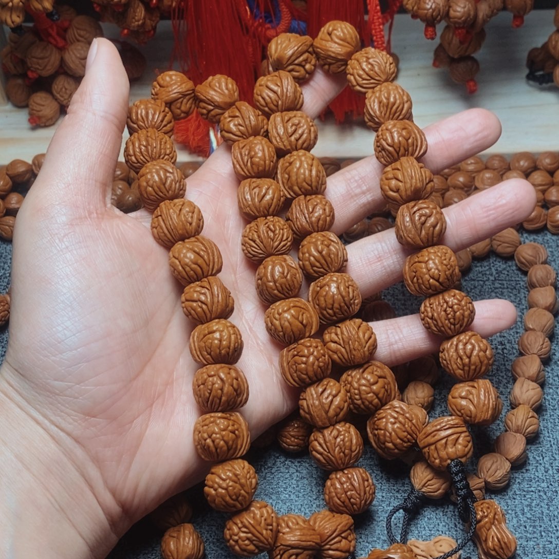 桃核吊坠桃枭手持1