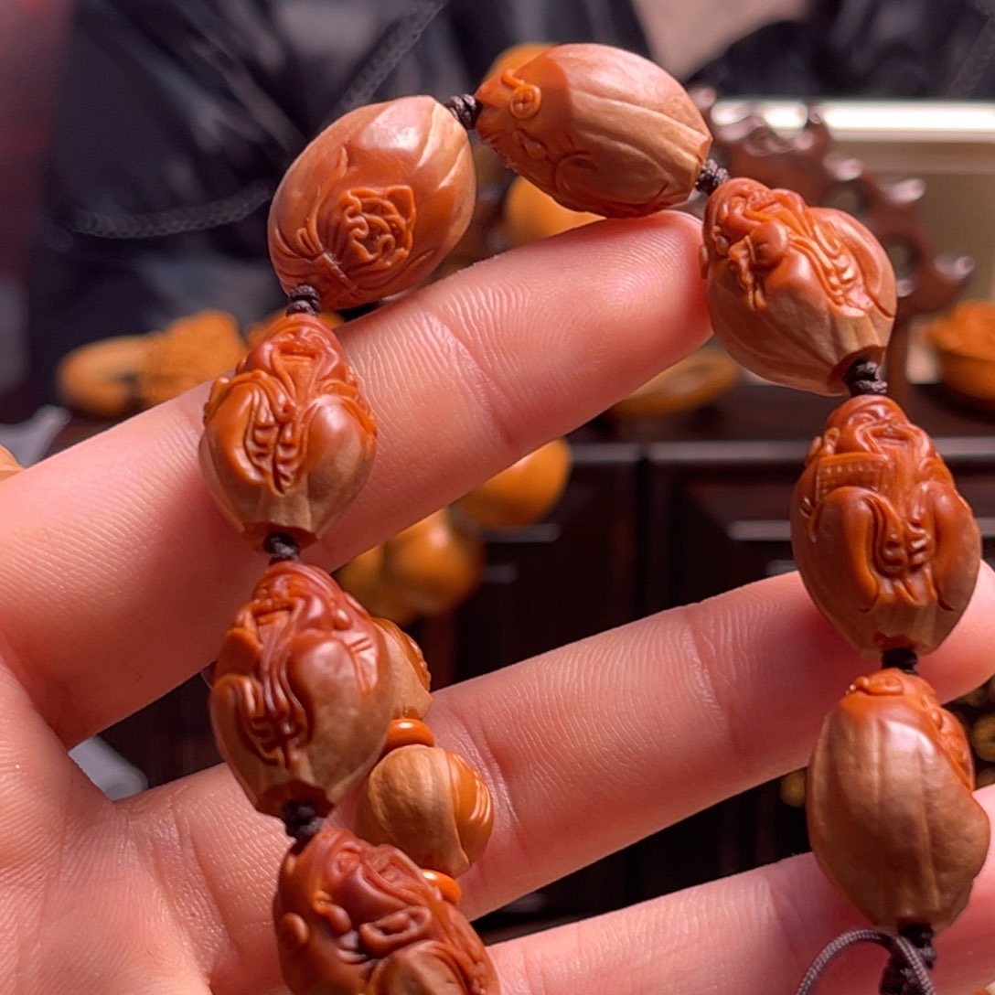 橄榄核吊坠?****⁹小籽财神