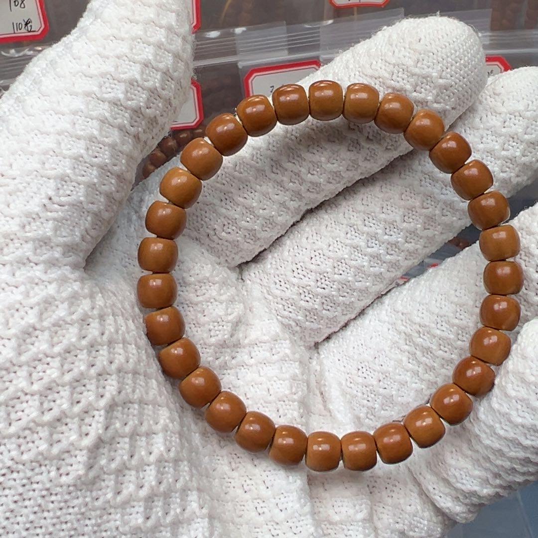 橄榄核吊坠福利：老挝核尖单圈手串7.2mm