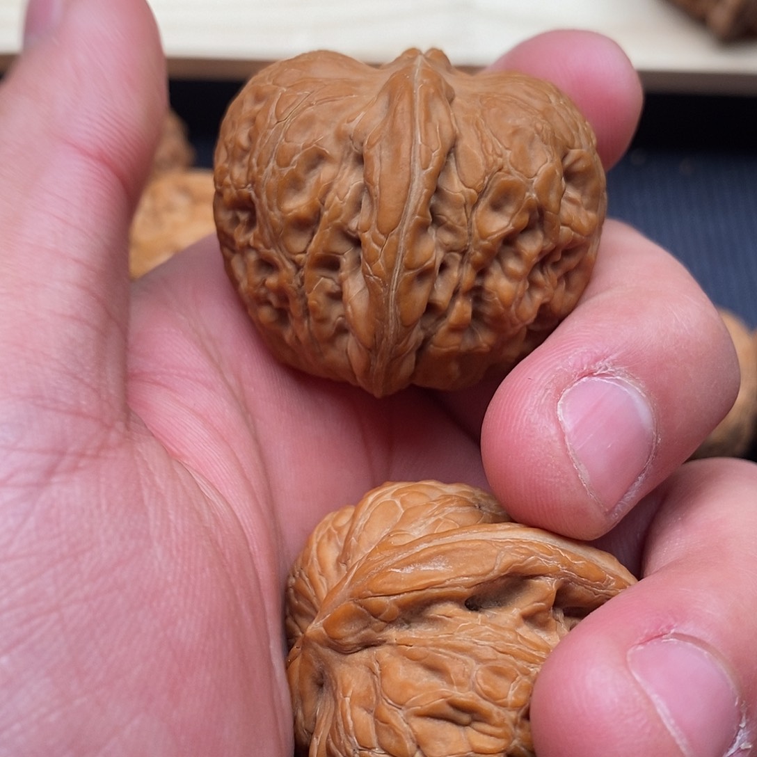 w***o吊坠文玩核桃元宝