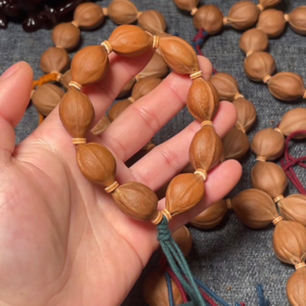 1524梅林铁三花橄榄素核原皮手串