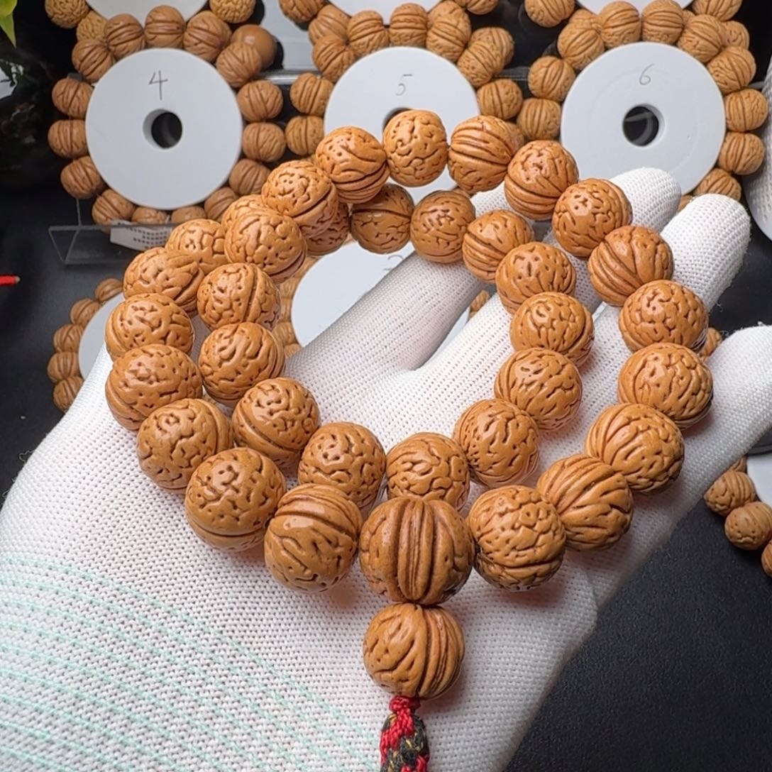 桃核手串盘锦野生大肌肉半挂