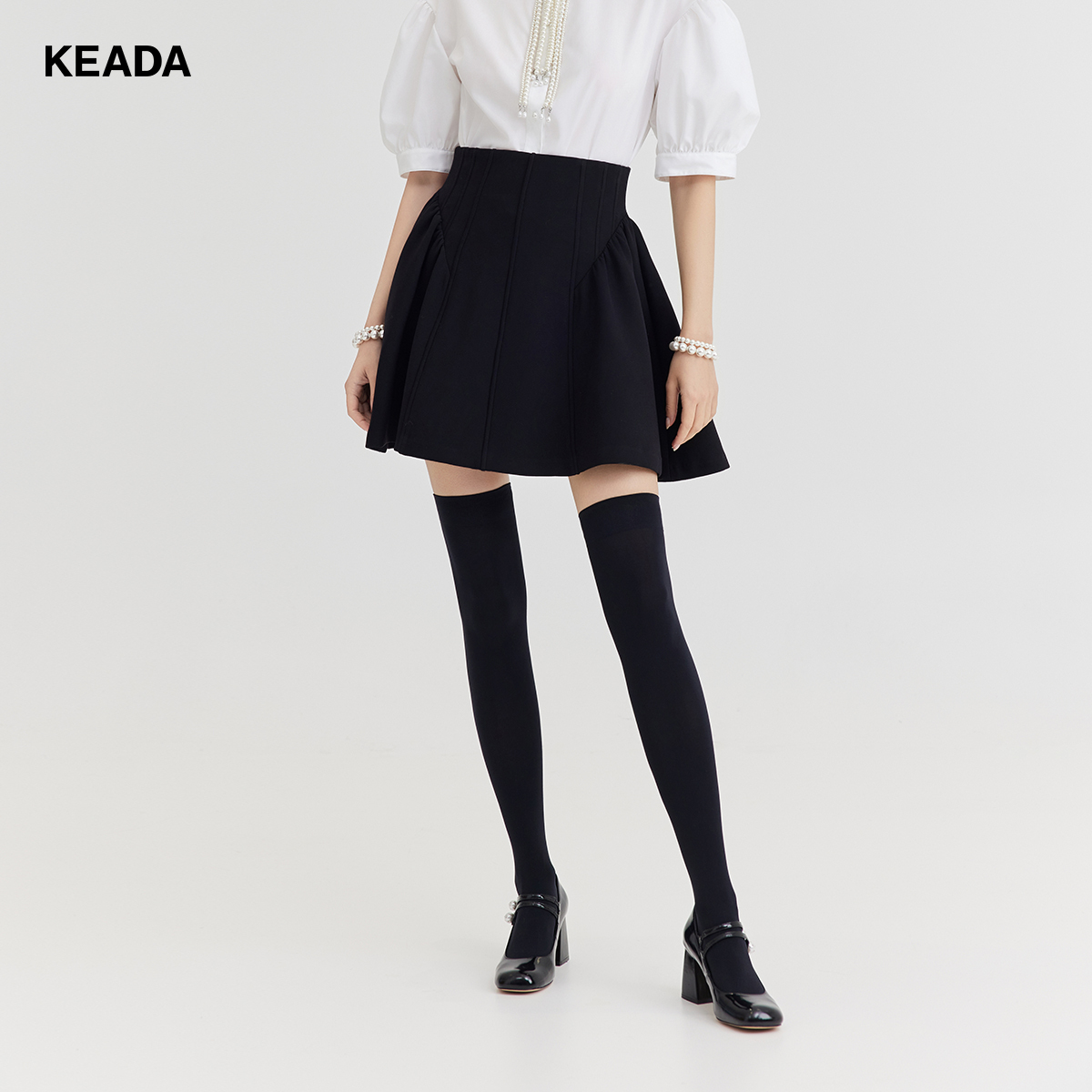 KEADA双层醋酸黑色a字半身裙高腰短裙梨型身材KSN3SK1255