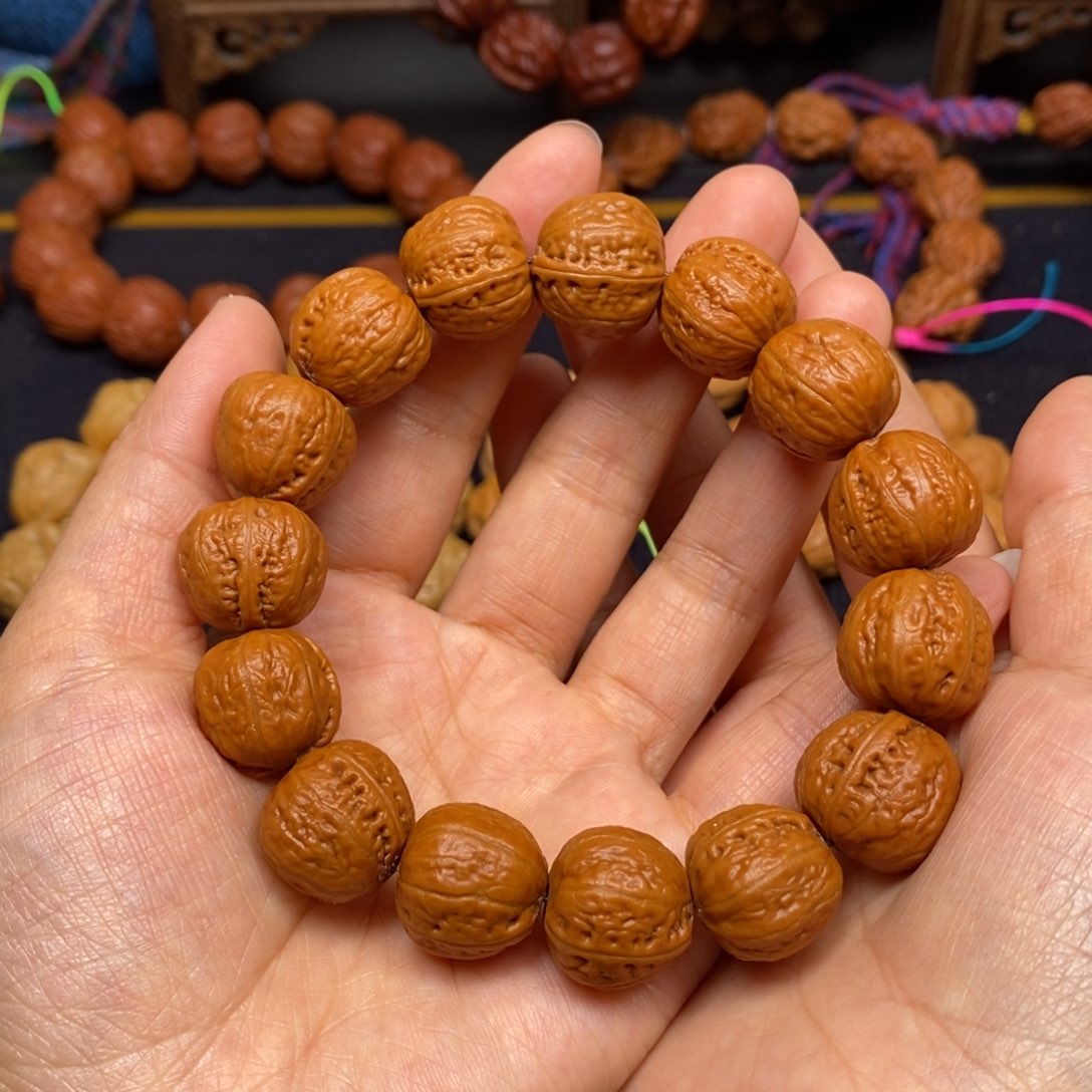 桃核手串养***?小光头元宝