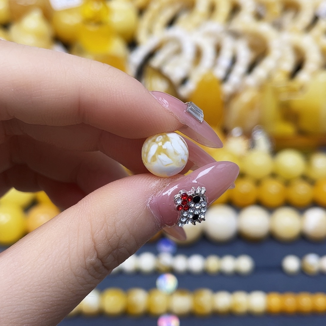 闲***着蜜蜡未镶嵌裸石9.7mm