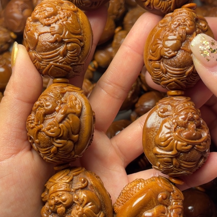 拒***绝橄榄核吊坠橄榄核手持