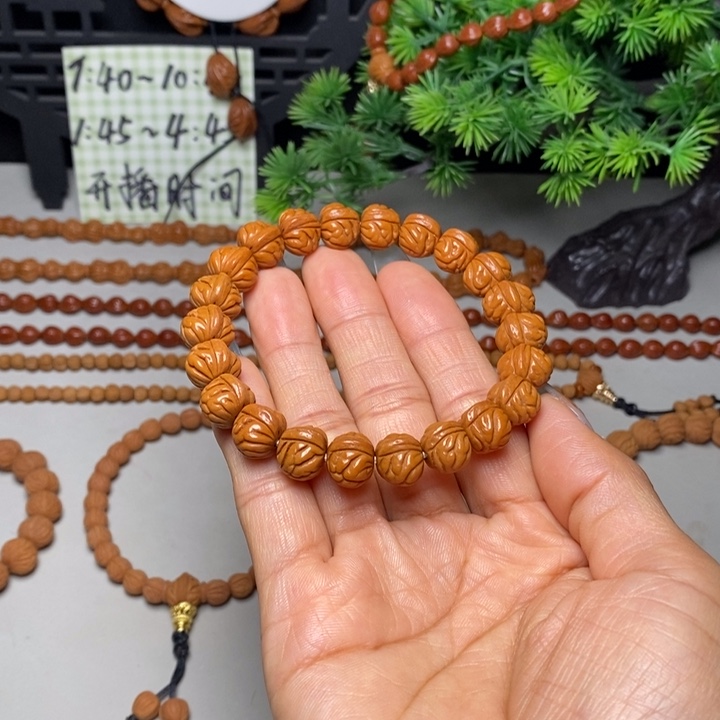 桃核手串凤羽手串