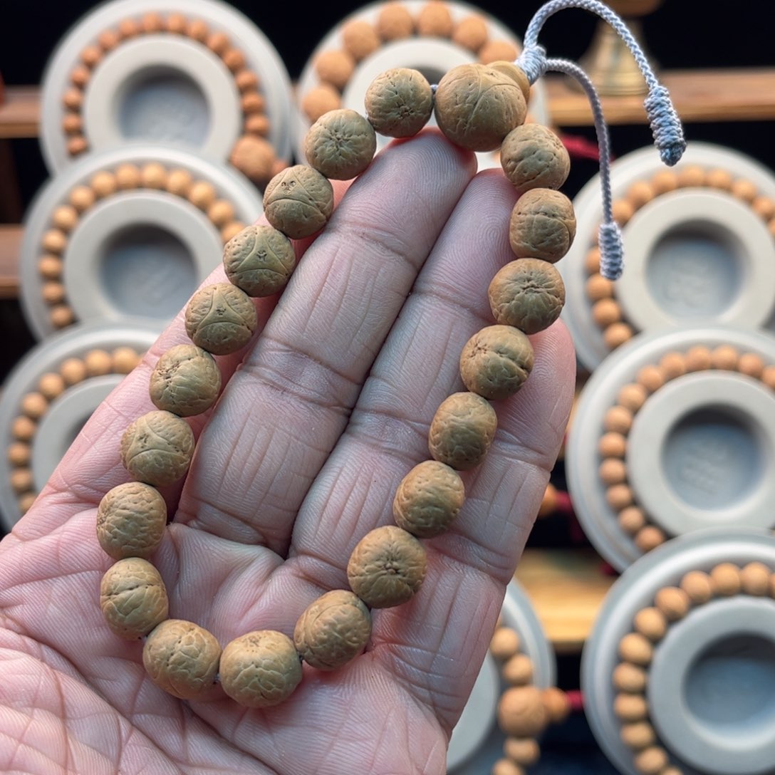 凤眼菩提吊坠11.5奶油皮同树籽龙眼手串