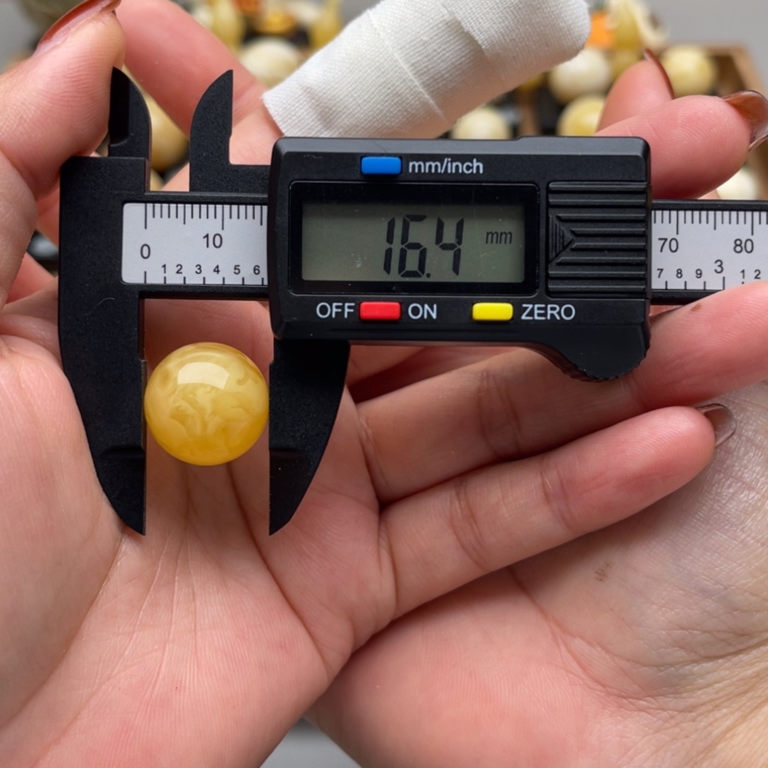 慧***签琥珀未镶嵌裸石蜜蜡圆珠笑