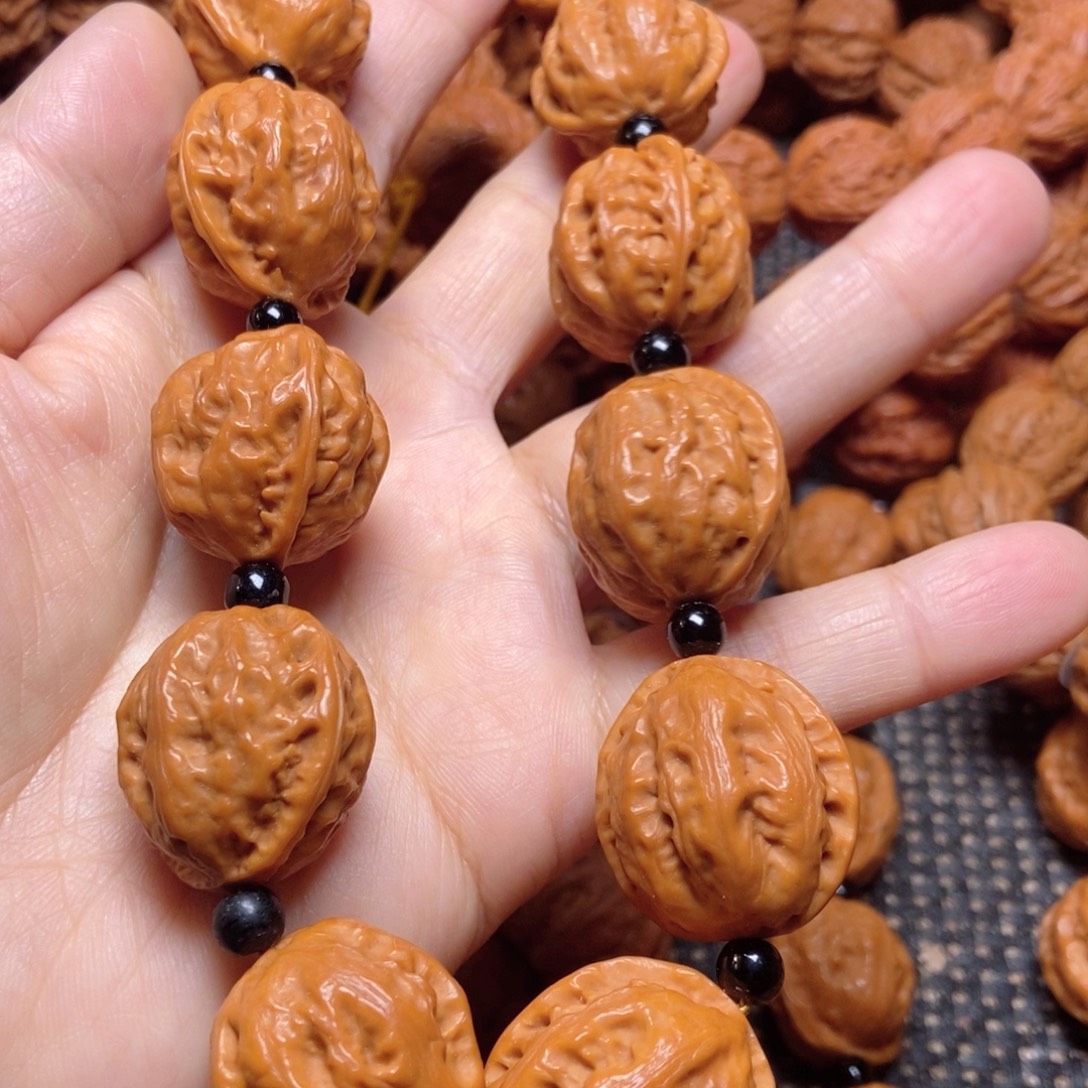 桃核吊坠官帽手持