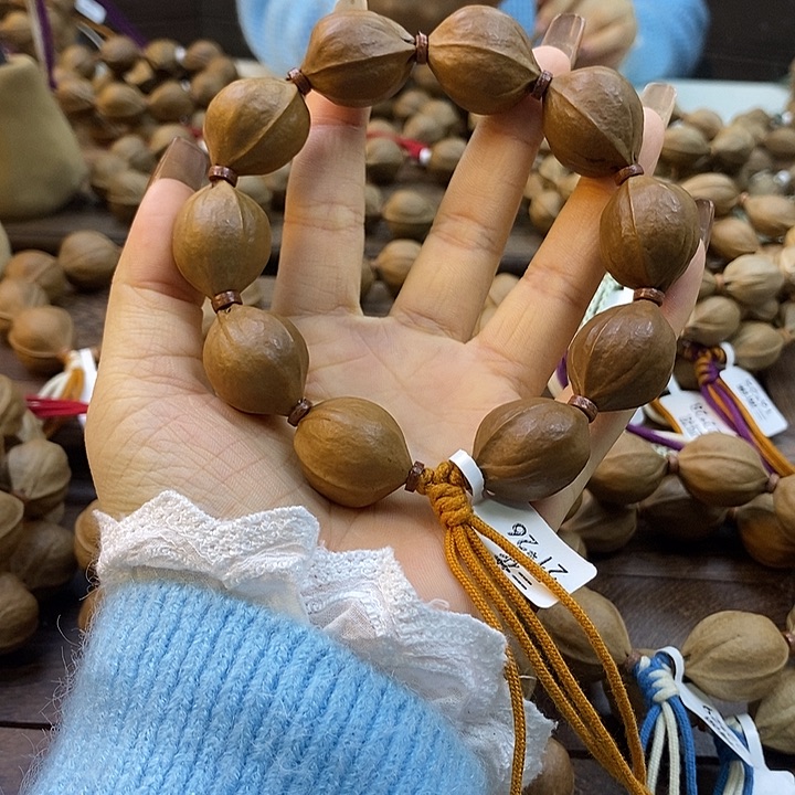 卖***李橄榄核吊坠梅林铁核