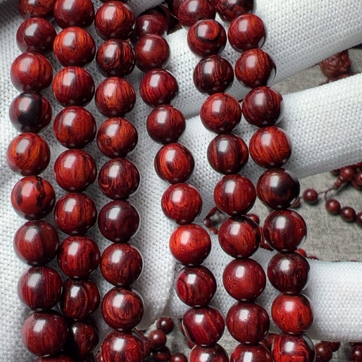 木已*置海南红降0.8圆珠108颗红油精品