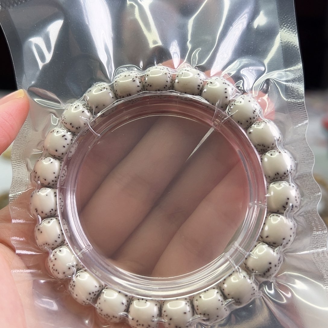 星月菩提手串Fqh10*9原白 大光头留白 针尖星