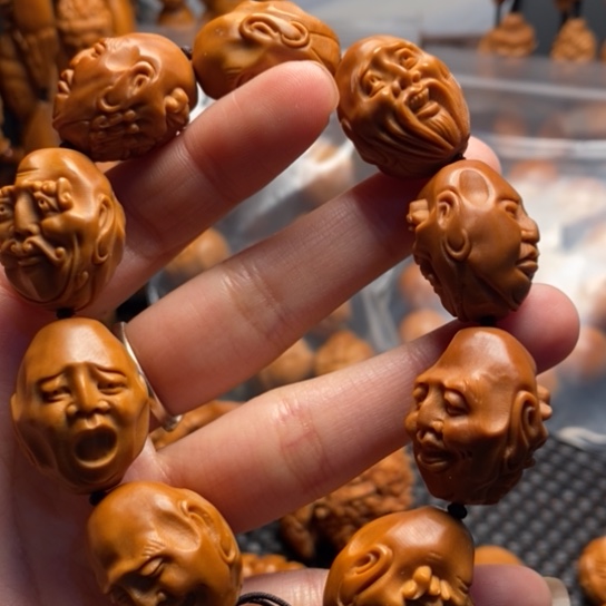 橄榄核吊坠老须派