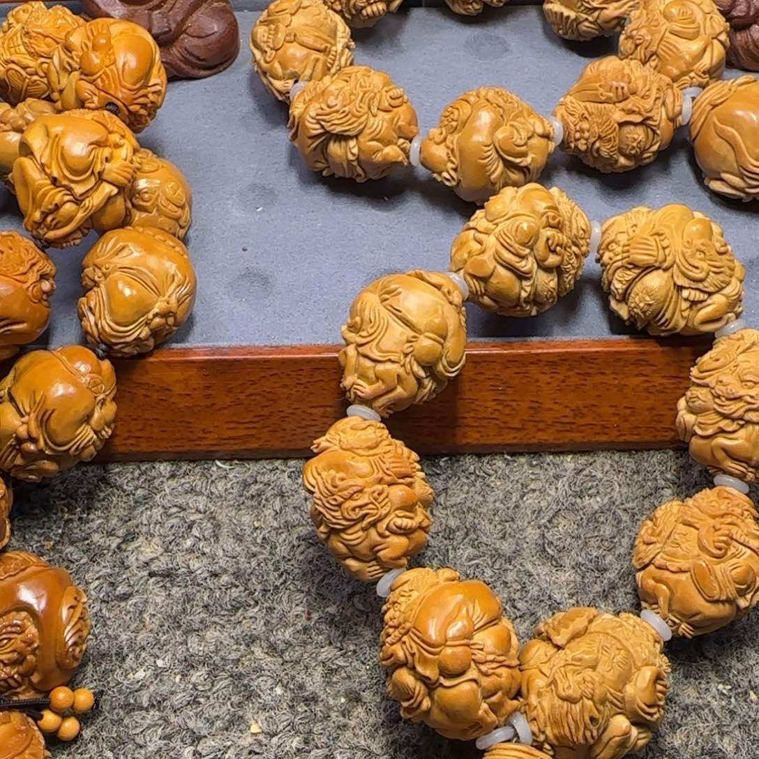 橄榄核吊坠私****何……………………