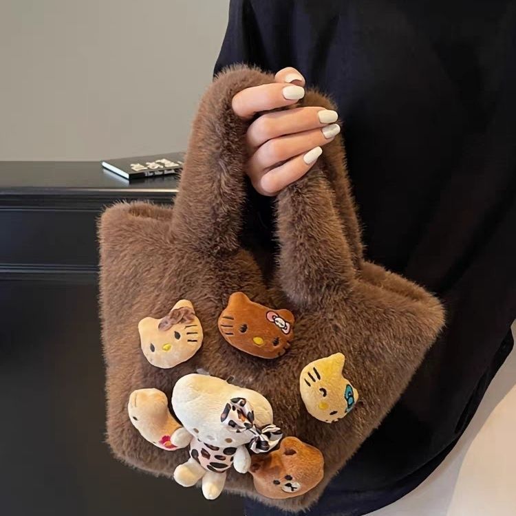 卡通可爱手拎包包女2025新款春夏质感毛茸茸手提水桶包百搭毛毛包