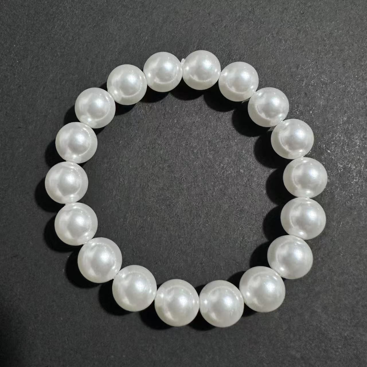 【顺丰包邮】高端极光澳白正圆深海海贝珠卡十手串（配证书）V77