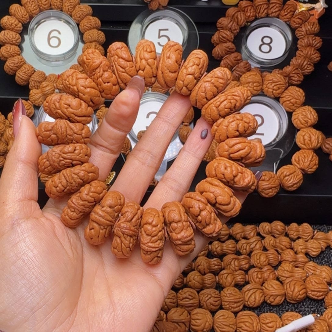 追***雄桃核吊坠霸王龙手串