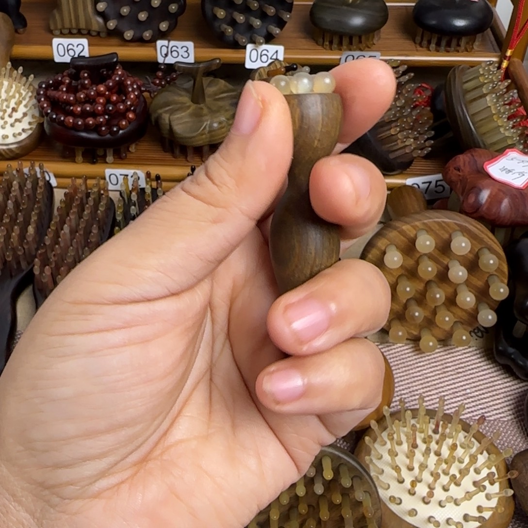 绿檀小眼棒9.9按摩梳