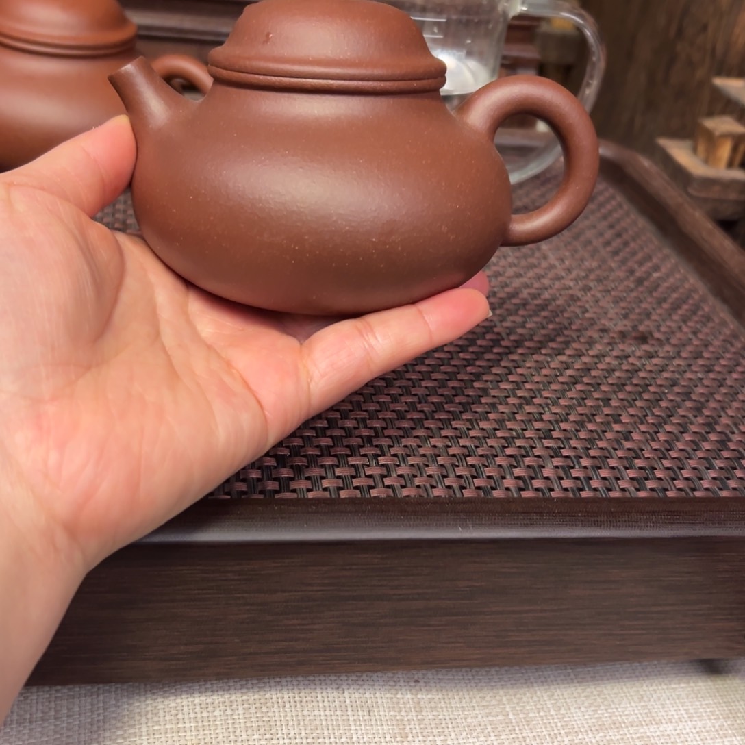 紫砂茶壶洋*?紫砂半手