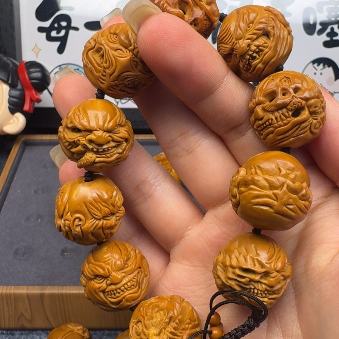 橄榄核吊坠向死而生