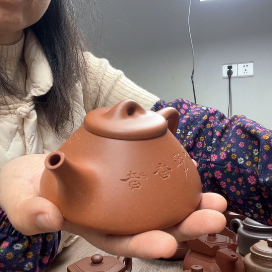 紫砂茶壶随*降坡泥石瓢