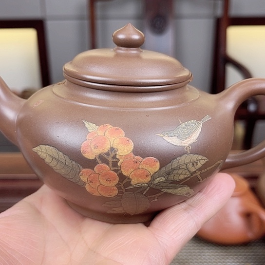 紫砂茶壶是的……是个很