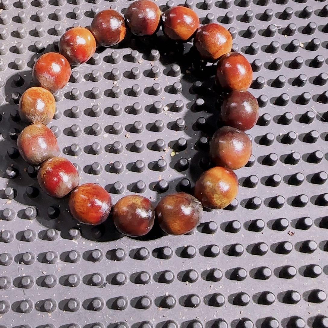 侯***哥吊坠草珠菩提无患子陈年橘黄籽单圈手串16籽