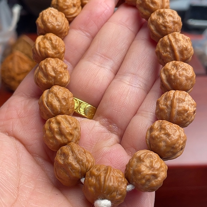 橄榄核吊坠猴头手串