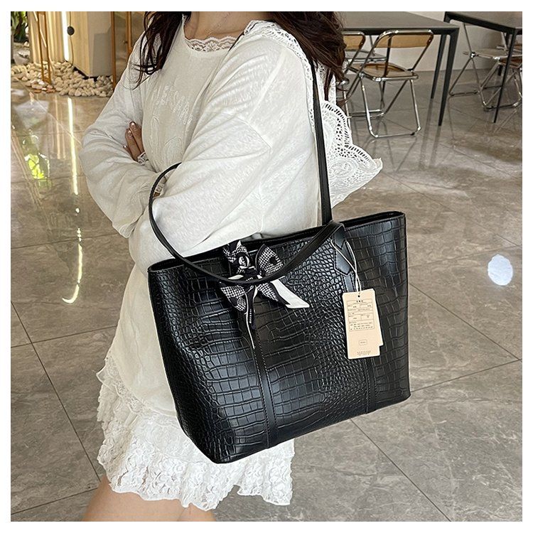 大容量水桶包包女2025春季新款上班通勤托特包子母手提单肩包潮