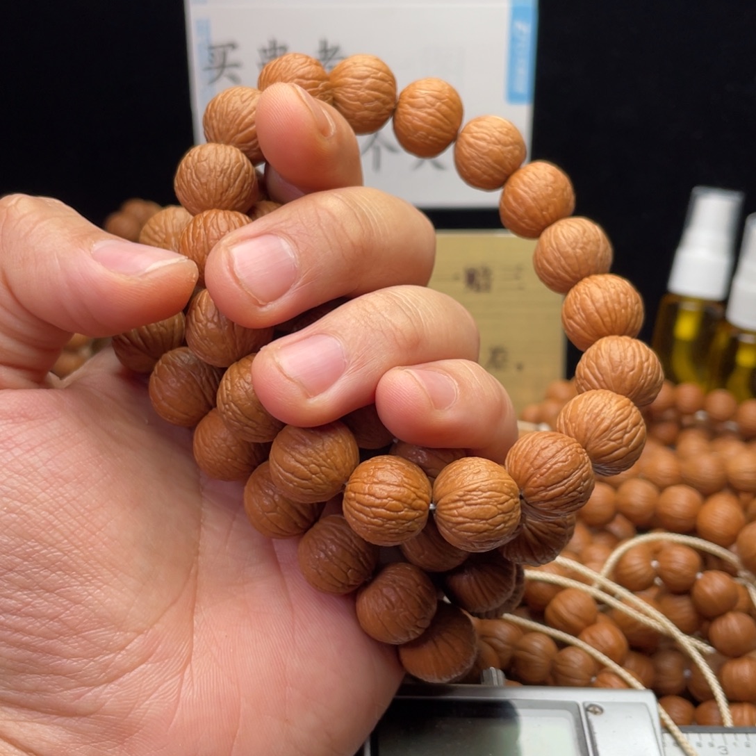 吊坠猴头核桃凤羽