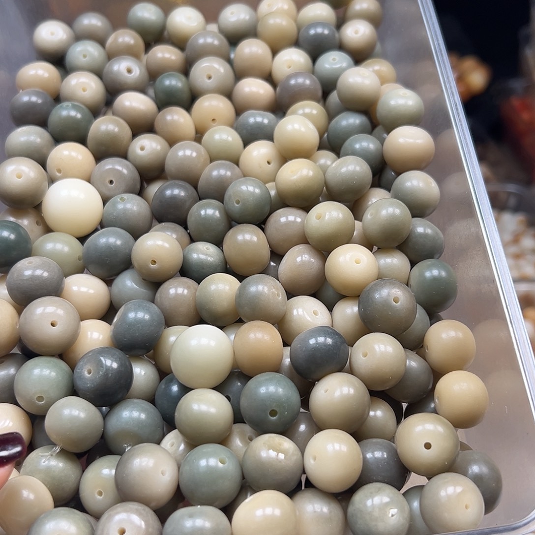 冷****菩提根/象牙果手串微瑕干磨苹果274颗