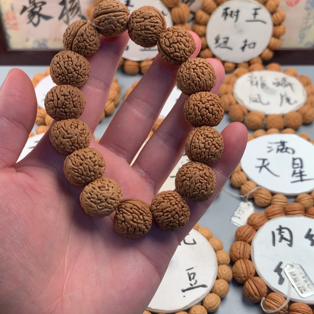 桃核手串龙鳞凤尾