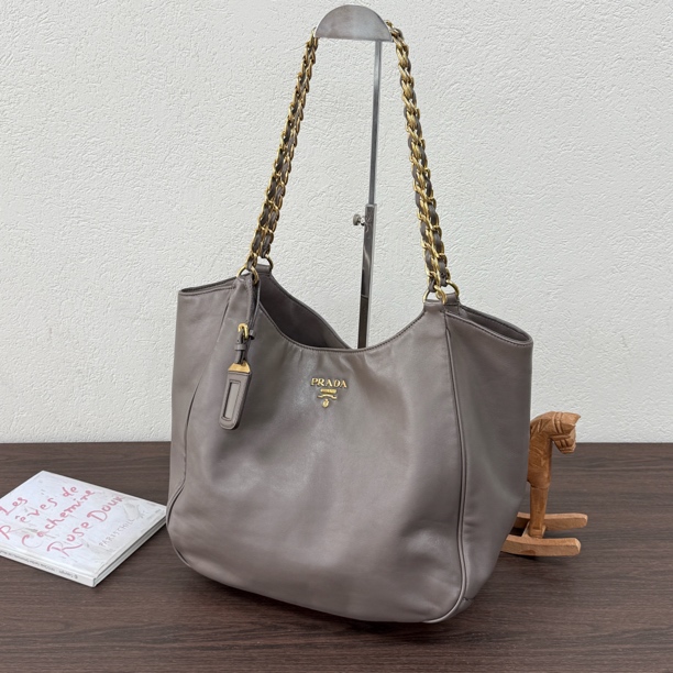 95新 Prada/普拉达 灰金小号垃圾袋单肩包117613