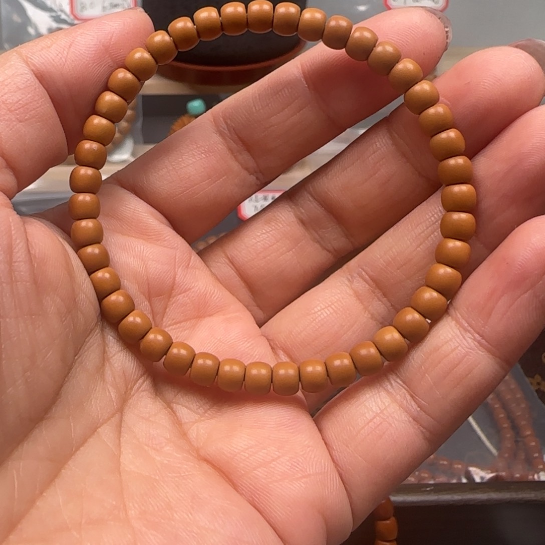 ****武手串橄榄核老挝单圈极限弧5.4mm