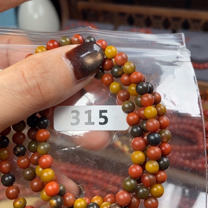 米***丽南红玛瑙合金手链