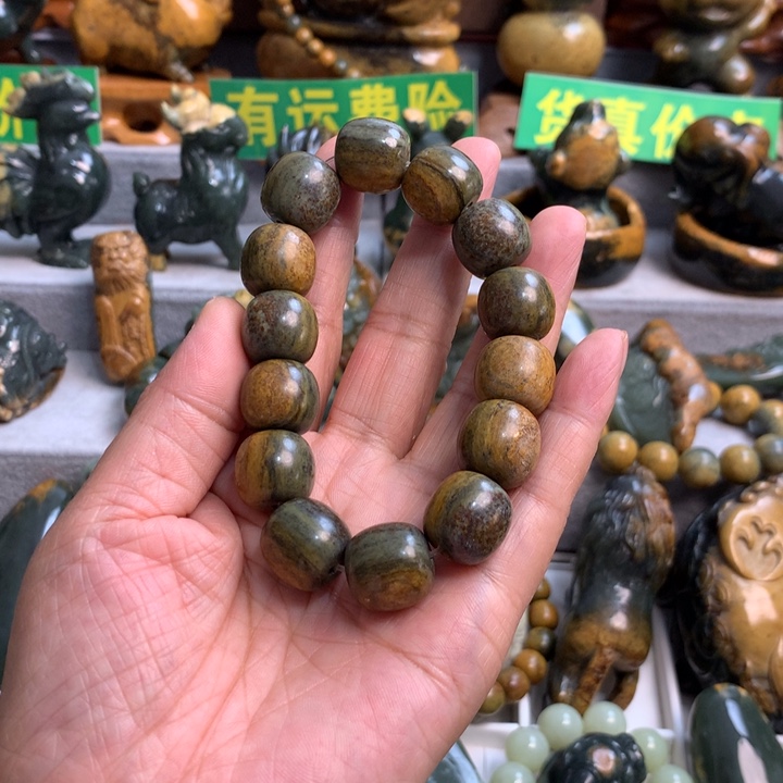 岫岩河磨玉（透闪石质玉）手把件未镶嵌一***阳