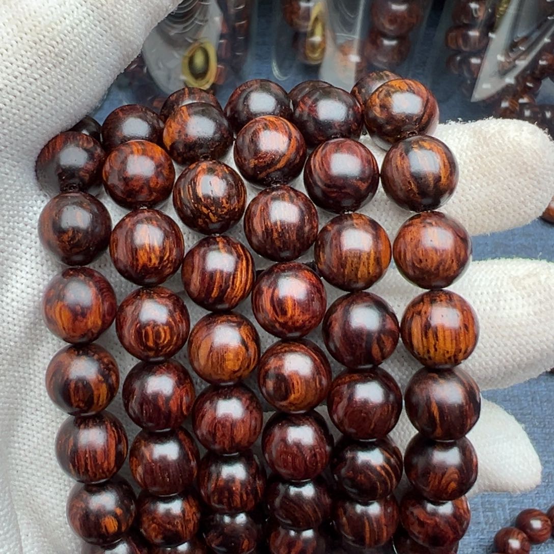木刁**六海南红降花梨公1.0圆珠黑金妖孽纹顶级超一档