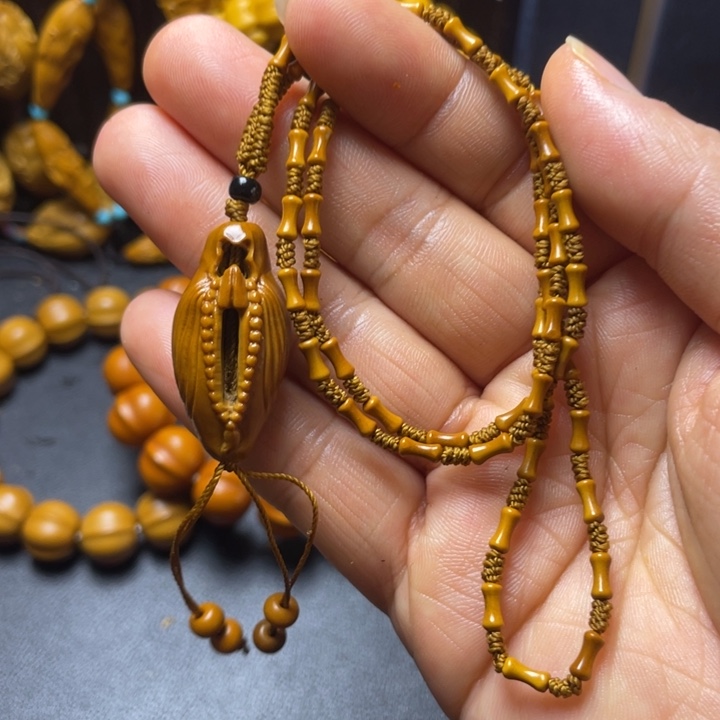 橄榄核吊坠啦啦啦啦