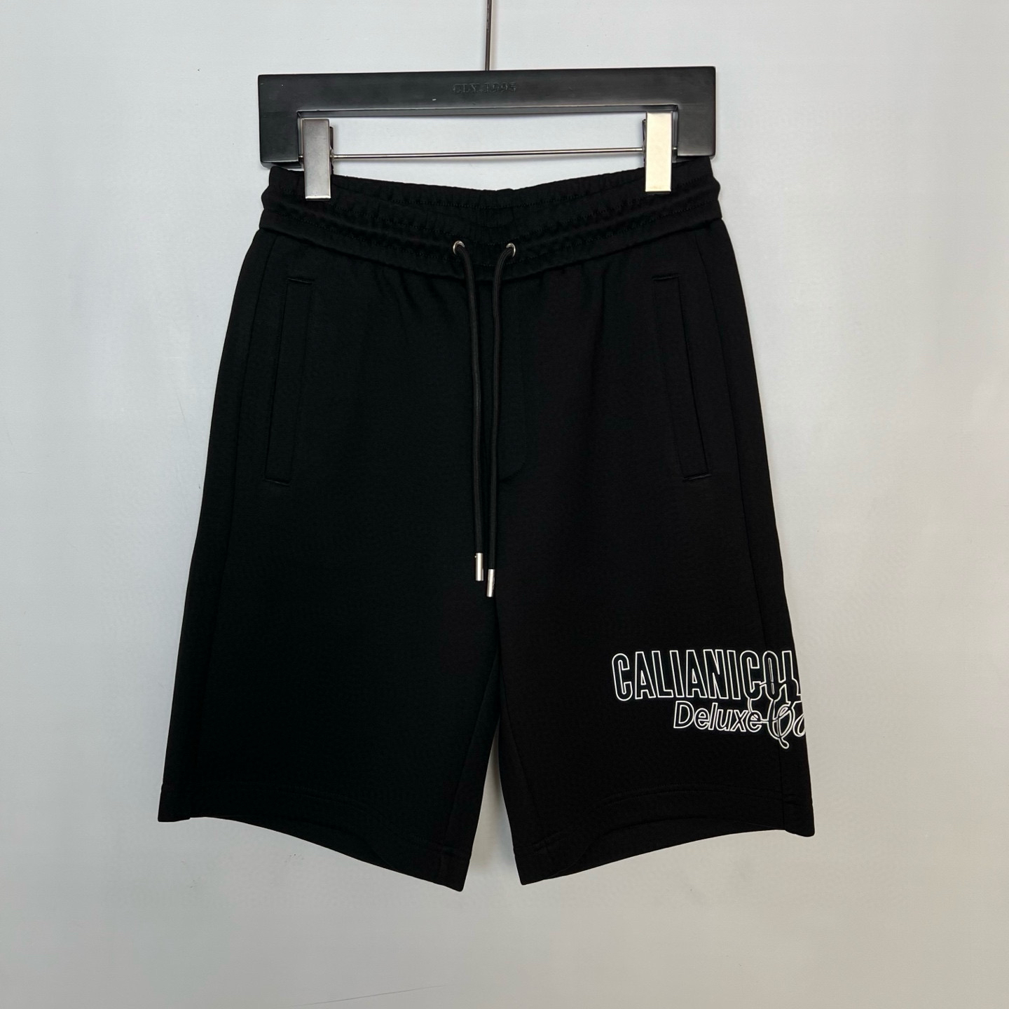 CALIANI/卡里亚尼 字母元素黑色休闲短裤 YN2522DK007  