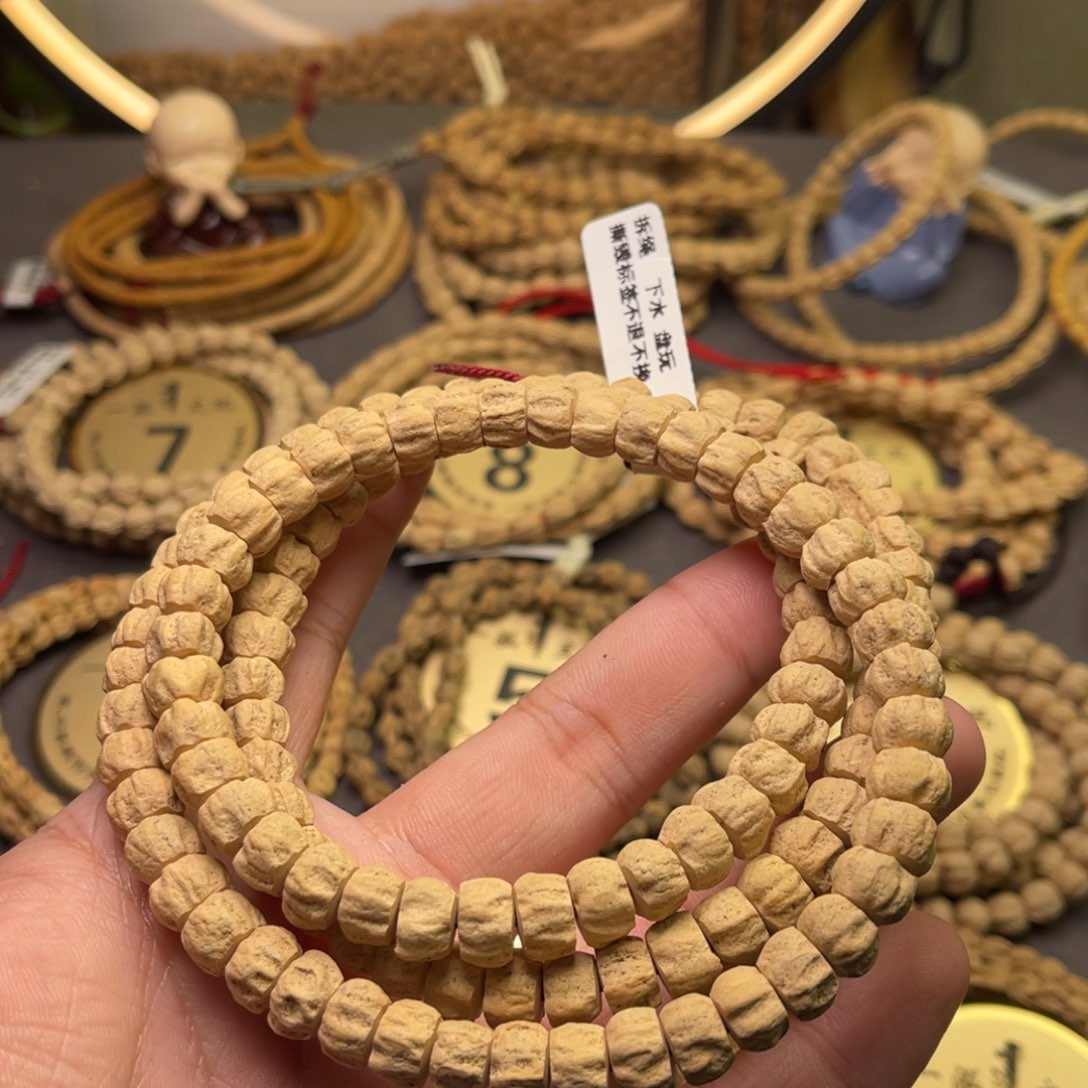 柏香籽/百香籽手串摆****店