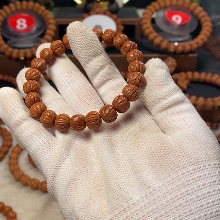 桃核吊坠M****哥秦岭龙纹