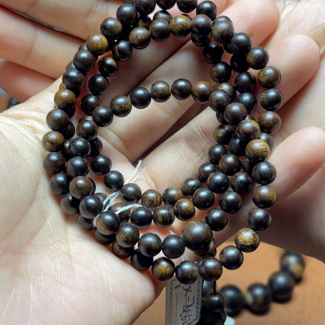 沉香手串用****7越南芽庄紫奇楠0.6瘿子留疤圆珠沉水级