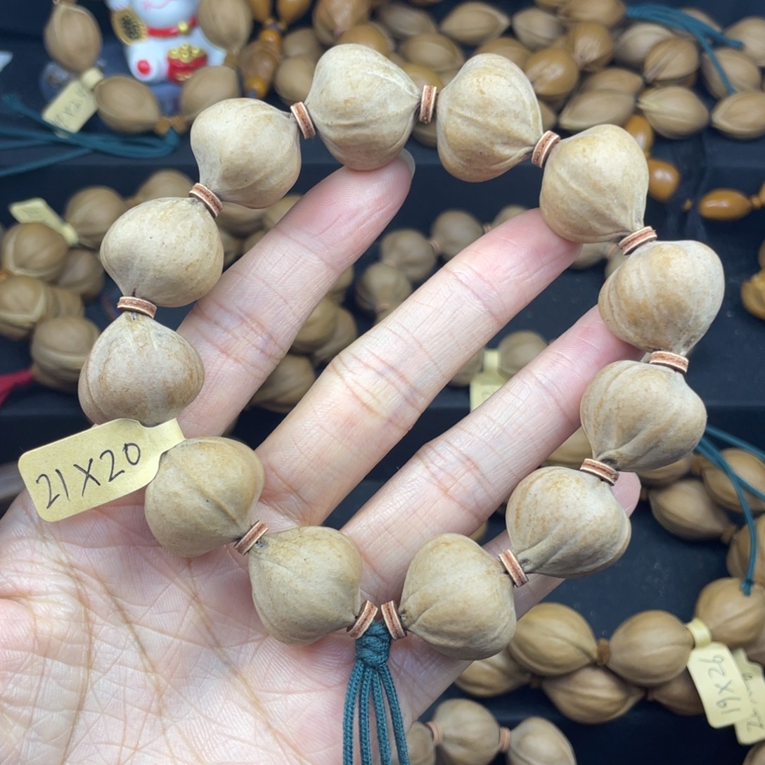 老***禾001橄榄核三花21*20